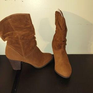 Cute brown cowboy-like boots